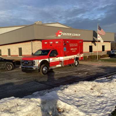 New Delivery for the Chippewa Falls Ambulance outside of the foster coach building.