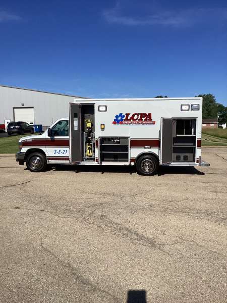 Photo of Logan County Paramedics Ambulance Side View Opened