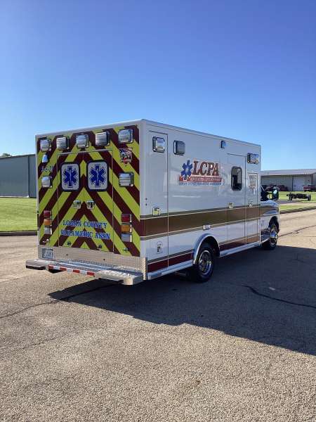 Photo of Logan County Paramedics Ambulance Side Back View 2