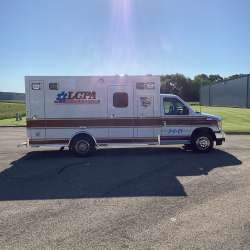 Photo of Logan County Paramedics Ambulance Side View 2