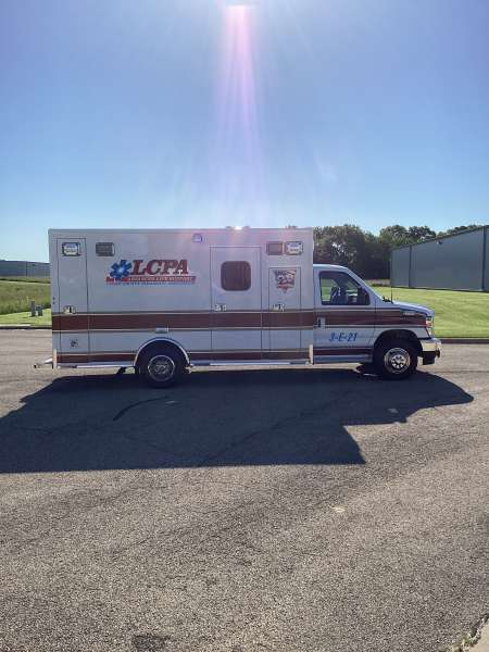 Photo of Logan County Paramedics Ambulance Side View 2