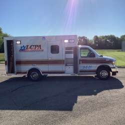 Photo of Logan County Paramedics Ambulance Side View 2 Opened