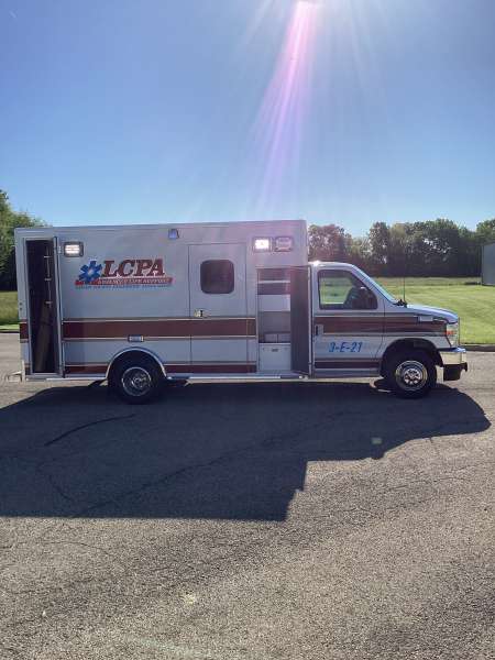 Photo of Logan County Paramedics Ambulance Side View 2 Opened