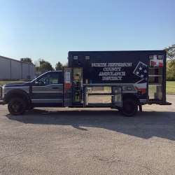 Photo of North Jefferson Ambulance Side View 1 Opened