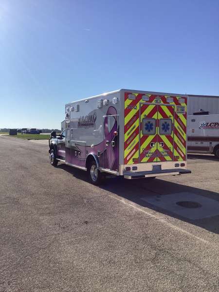 Photo of Logan County Paramedics new delivery showcasing the exterior of the vehicle and it's features.