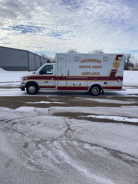 Photo of New delivery of the Luxemburg Rescue Squad-Ambulance outdoors.