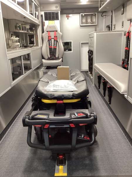 Photo of New Delivery Mundelein Fire Department interior view of the ambulance showcasing various hardware, cabinetry, and more.