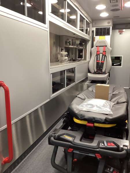 Photo of New Delivery Mundelein Fire Department interior view of the ambulance showcasing various hardware, cabinetry, and more.