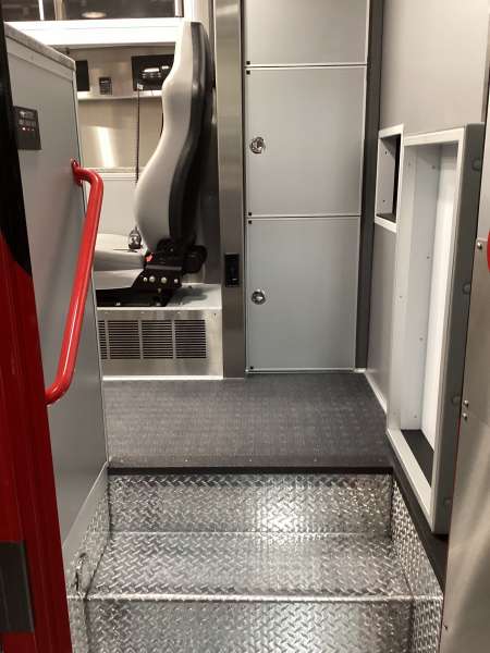 Photo of New Delivery Mundelein Fire Department interior view of the ambulance showcasing various hardware, cabinetry, and more.