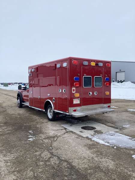 Photo of New Naperville Fire Department delivery outside showcasing the exterior of the vehicle with a snowy background.
