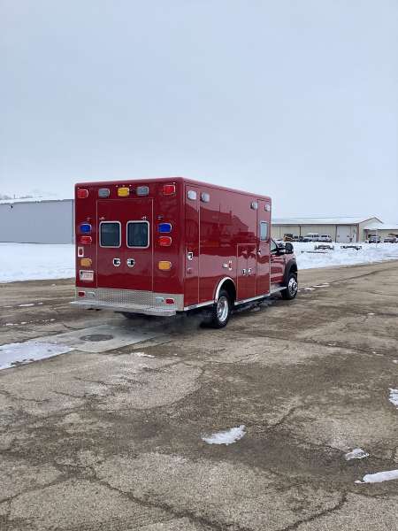 Photo of New Naperville Fire Department delivery outside showcasing the exterior of the vehicle with a snowy background.