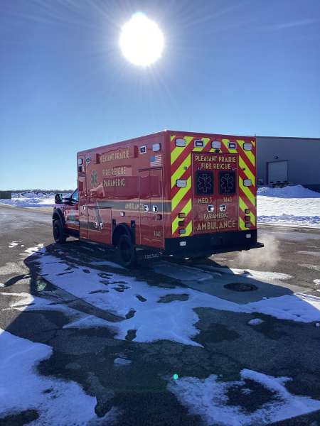 Photo of New Delivery Pleasant Prairie Fire Rescue exterior shot showcasing the ambulance with snow surrounding.