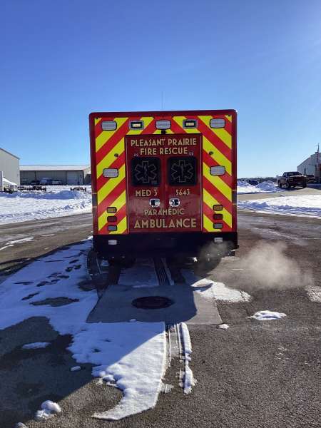 Photo of New Delivery Pleasant Prairie Fire Rescue exterior shot showcasing the ambulance with snow surrounding.