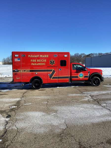 Photo of New Delivery Pleasant Prairie Fire Rescue exterior shot showcasing the ambulance with snow surrounding.