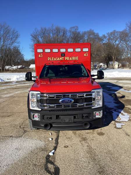 Photo of New Delivery Pleasant Prairie Fire Rescue exterior shot showcasing the ambulance with snow surrounding.