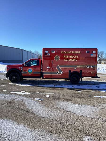 Photo of New Delivery Pleasant Prairie Fire Rescue exterior shot showcasing the ambulance with snow surrounding.