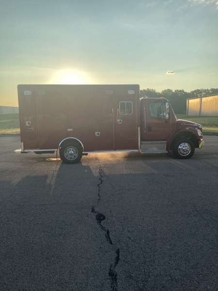 Photo of Spring Grove fire Department New Delivery outside in natural lighting showcasing the ambulance.