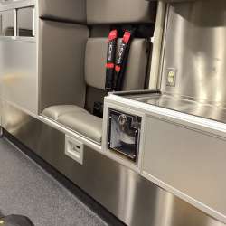 Photo of Wauconda Fire Dist. New Delivery outside showcasing the interior of the ambulance and all of its hardware.