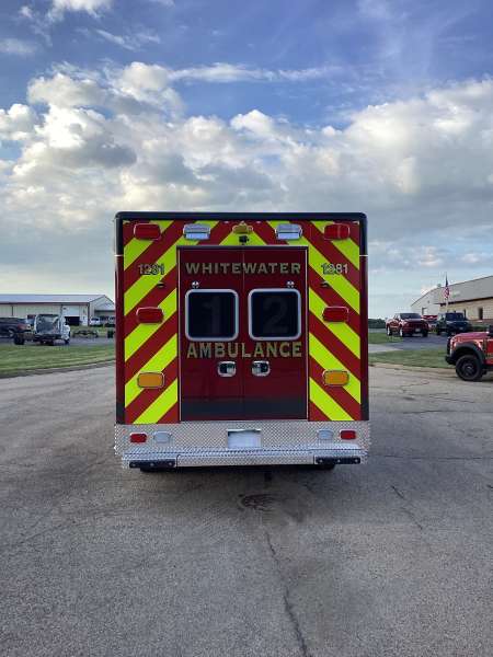 Photo of New Delivery Whitewater Fire Department Outside showcasing the new ambulance.