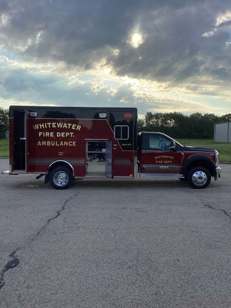 Photo of New Delivery Whitewater Fire Department Outside showcasing the new ambulance.