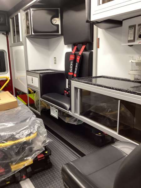 Photo of New Delivery Whitewater Fire Department interior view showcasing various hardware and equipment.