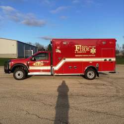 Photo of Foster Coach new delivery for East Joliet Fire showcasing the exterior of the new vehicle.