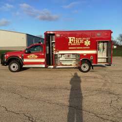 Photo of Foster Coach new delivery for East Joliet Fire showcasing the exterior of the new vehicle.
