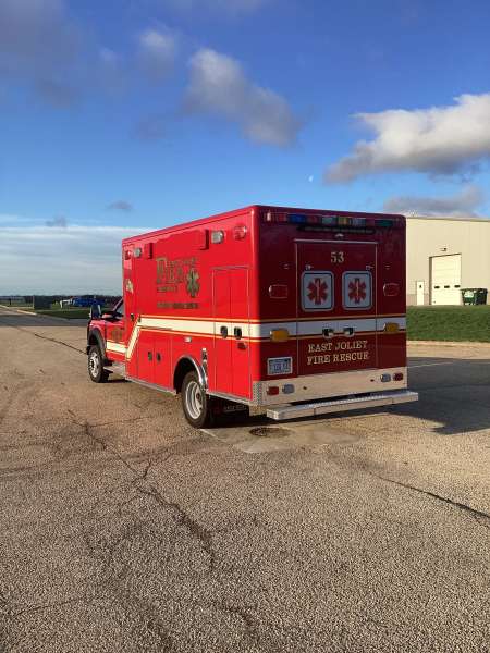 Photo of Foster Coach new delivery for East Joliet Fire showcasing the exterior of the new vehicle.