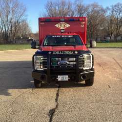 Photo of Foster Coach new delivery for East Joliet Fire showcasing the exterior of the new vehicle.