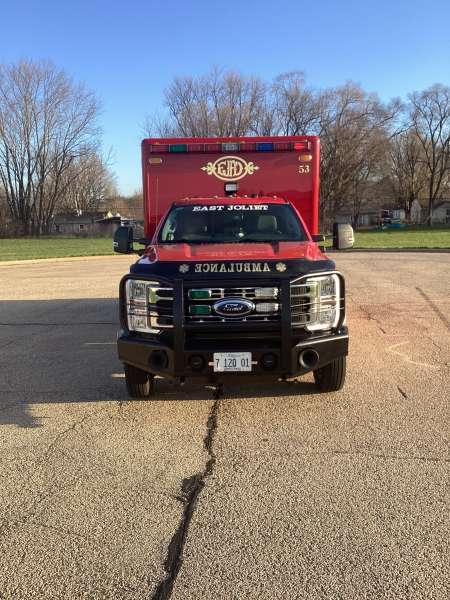 Photo of Foster Coach new delivery for East Joliet Fire showcasing the exterior of the new vehicle.