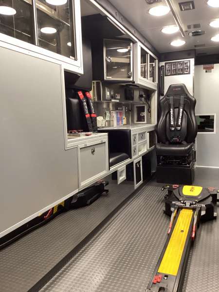 Photo of Foster Coach new delivery for East Joliet Fire showcasing the interior and cabin of the new vehicle.