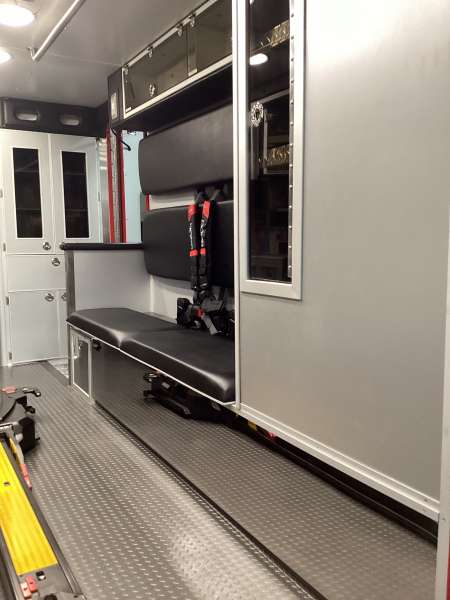 Photo of Foster Coach new delivery for East Joliet Fire showcasing the interior and cabin of the new vehicle.