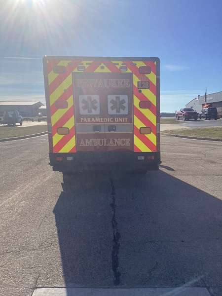 Photo of City of Pewaukee Paramedic Unit ambulance parked outdoors.