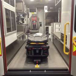 Photo of Interior view of the ambulance patient care area.