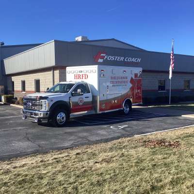 New ambulance vehicle delivery for the Harlem Roscoe Fire Department outside of the Foster Coach building.