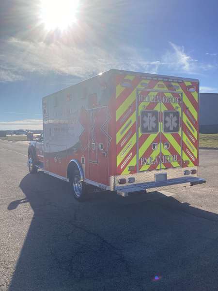 Photo of Roscoe Fire Department ambulance vehicle being showcased outside.
