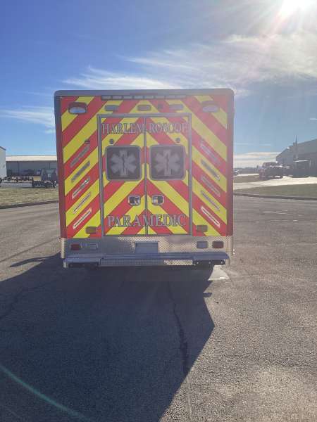 Photo of Roscoe Fire Department ambulance vehicle being showcased outside.