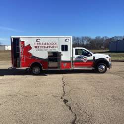 Photo of Roscoe Fire Department ambulance vehicle being showcased outside.