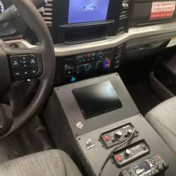 Photo of Roscoe Fire Department ambulance vehicle showing the interior drivers cab with included hardware.
