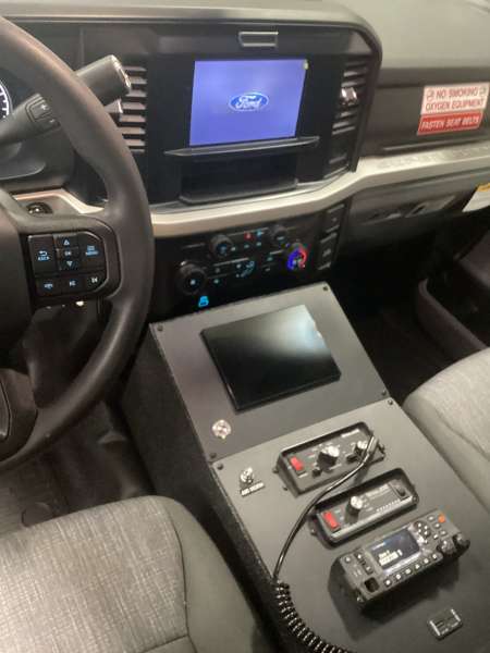 Photo of Roscoe Fire Department ambulance vehicle showing the interior drivers cab with included hardware.