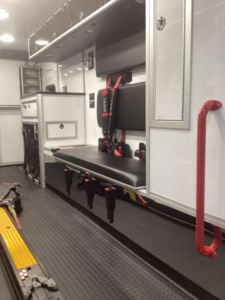 Photo of Roscoe Fire Department ambulance vehicle showing the interior with available equipment and hardware.
