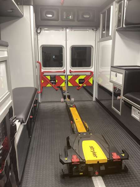 Photo of Roscoe Fire Department ambulance vehicle showing the interior with available equipment and hardware.