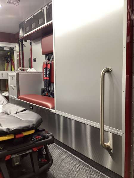Photo of Interior view of the ambulance patient care area.