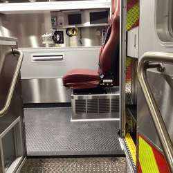 Photo of Interior view of the ambulance patient care area.