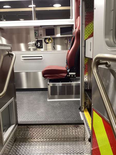 Photo of Interior view of the ambulance patient care area.