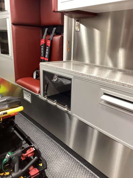 Photo of Interior view of the ambulance patient care area.
