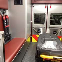 Photo of Interior view of the ambulance patient care area.