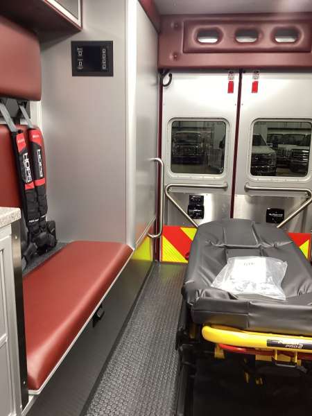 Photo of Interior view of the ambulance patient care area.