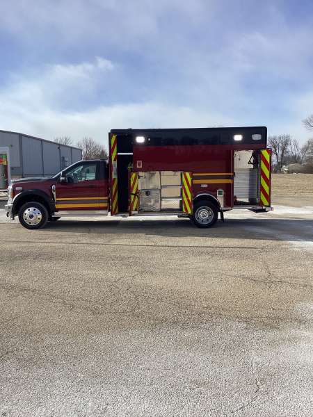 Photo of Troy Fire Department ambulance parked outdoors showcasing the vehicle.