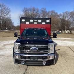 Photo of Troy Fire Department ambulance parked outdoors showcasing the vehicle.